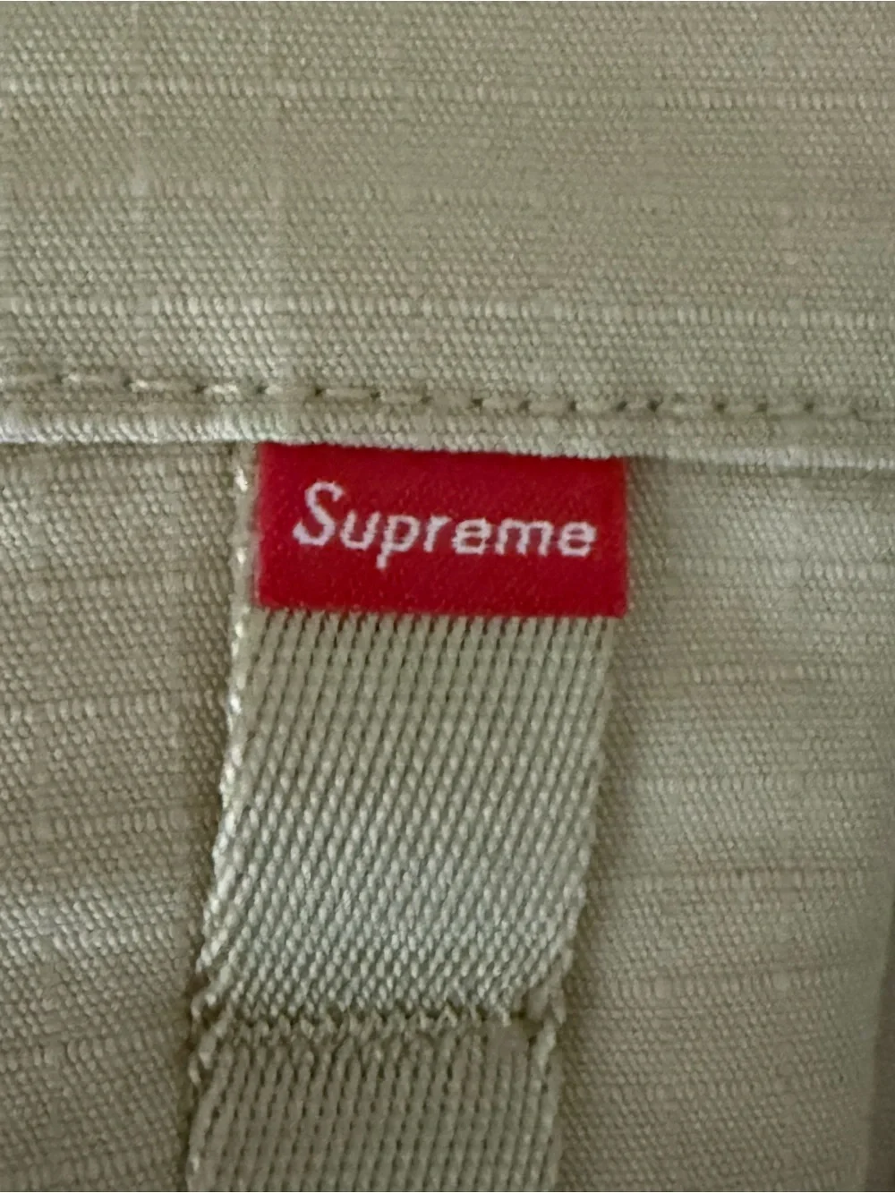Supreme logo tab